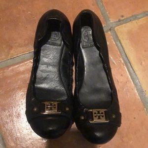 Tory Burch flats with gold buckles
